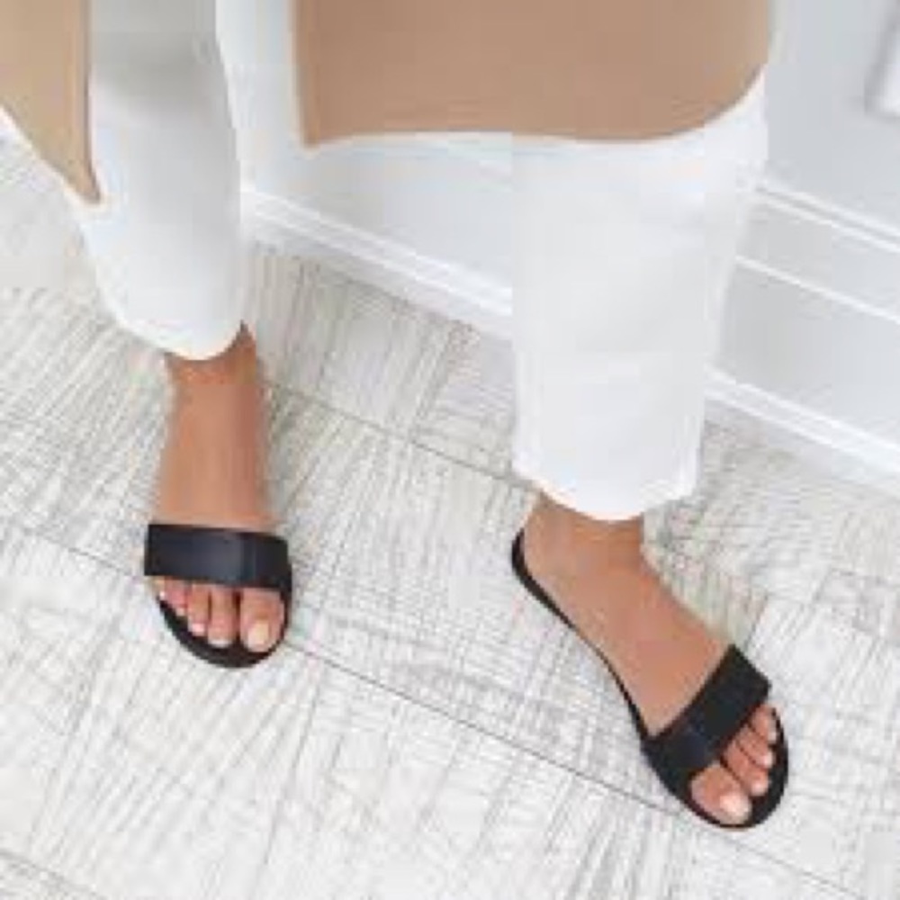Black leather slides